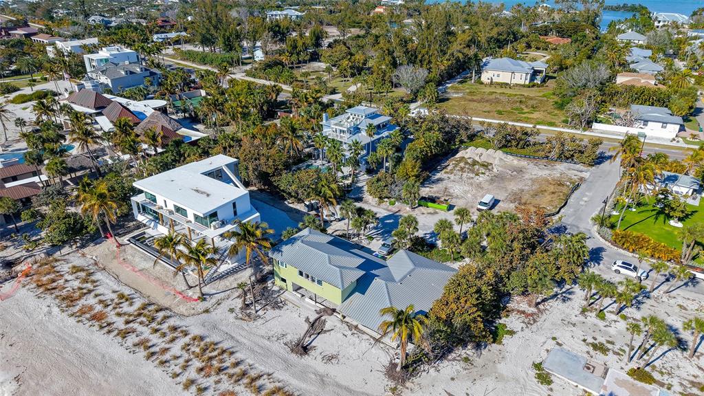 6603 Gulfside Road Longboat Key, FL 34228 - Photo 32 of 40 an aerial view of residential houses with outdoor space