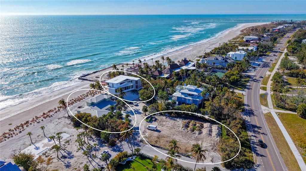 6603 Gulfside Road Longboat Key, FL 34228 - Photo 37 of 40 a view of a ocean from a balcony