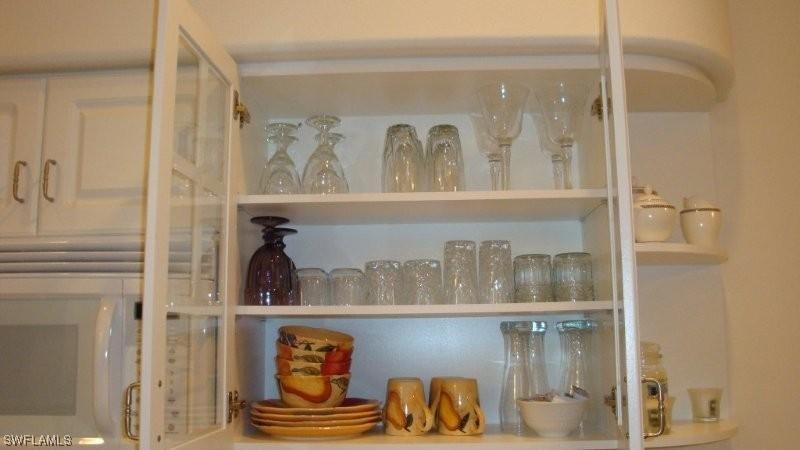 8088 Ibis Cove Circle, Unit 804 Naples, FL 34119 - Photo 20 of 27 a view of wooden door