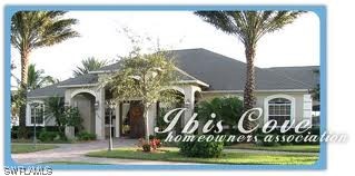 8088 Ibis Cove Circle, Unit 804 Naples, FL 34119 - Photo 3 of 27 a front view of a house with garden