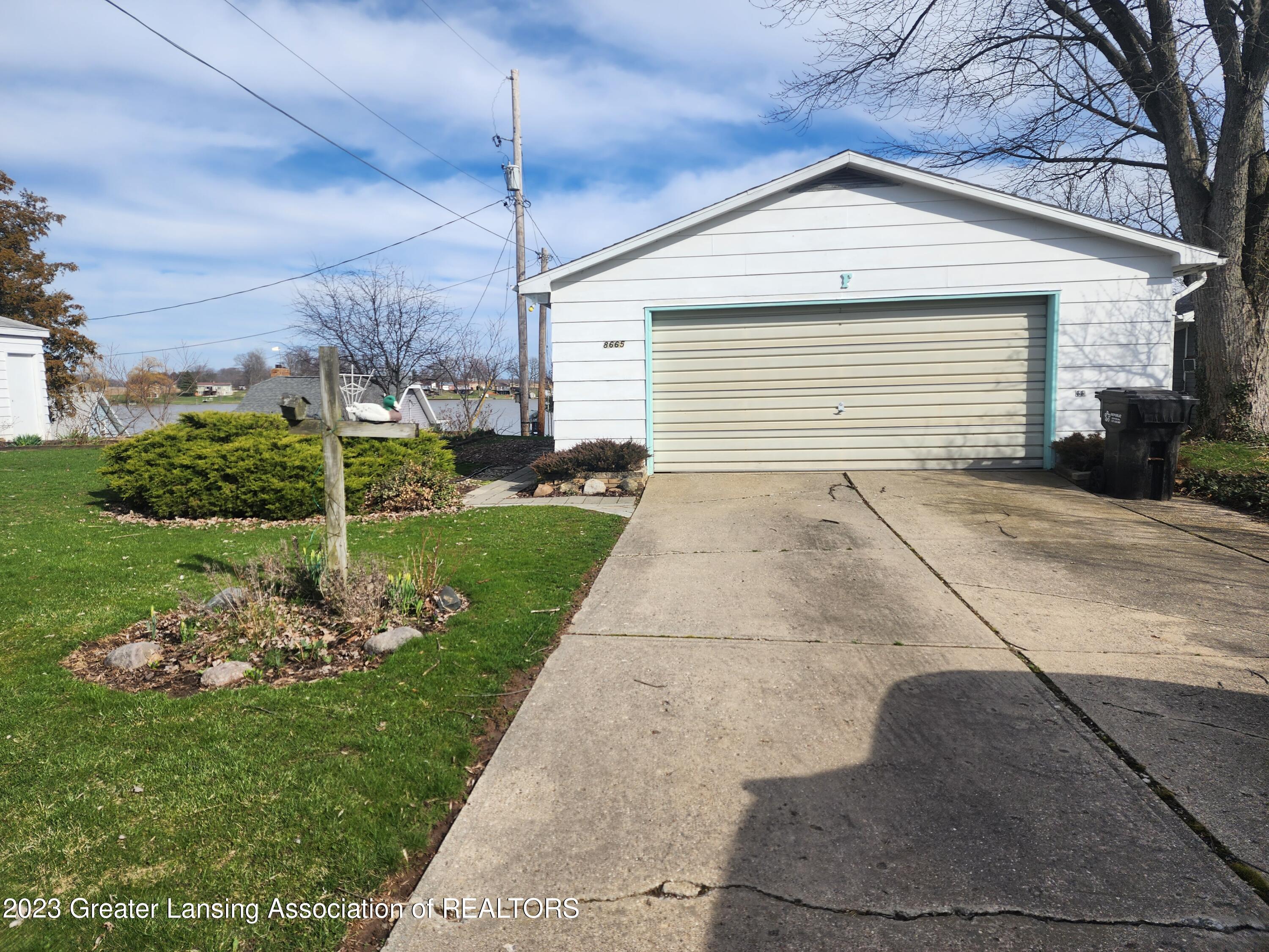 8665 Narrow Lake Road Springport, MI 49284 - Photo 6 of 11 6 Front of Main garage