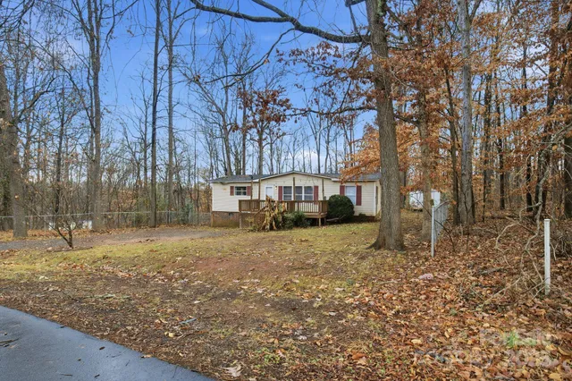 a house with trees in front of it