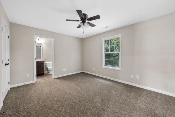 a view of room with ceiling fan