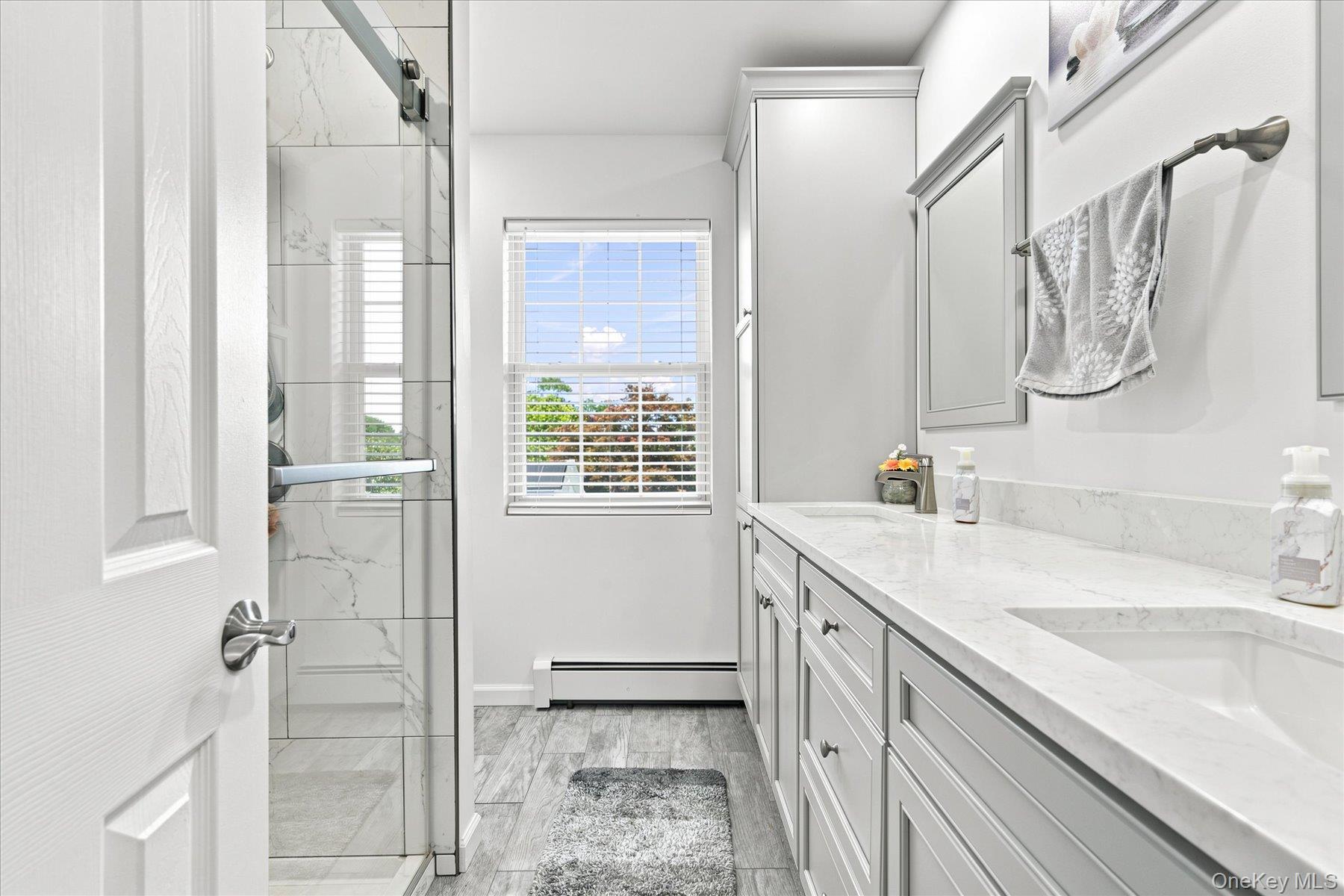 85 Maple Road Rocky Point, NY 11778 - Photo 24 of 40 Brand new primary bathroom with instant hot water.