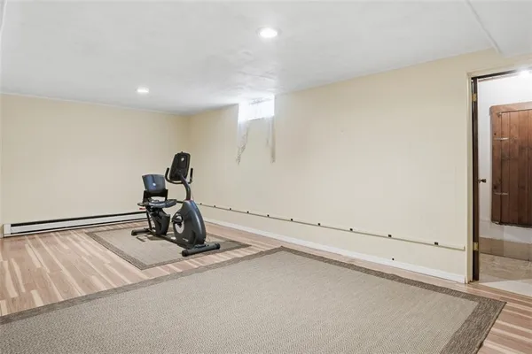 a view of workspace room with gym equipment