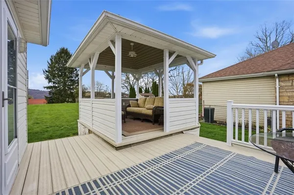 a view of a chairs on the deck