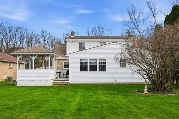 a view of a house with a big yard