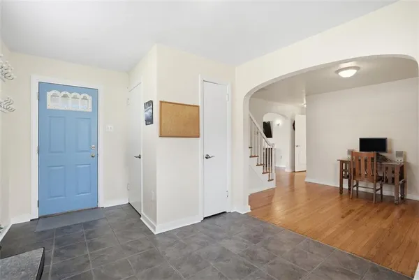 a view of a livingroom with a kitchen