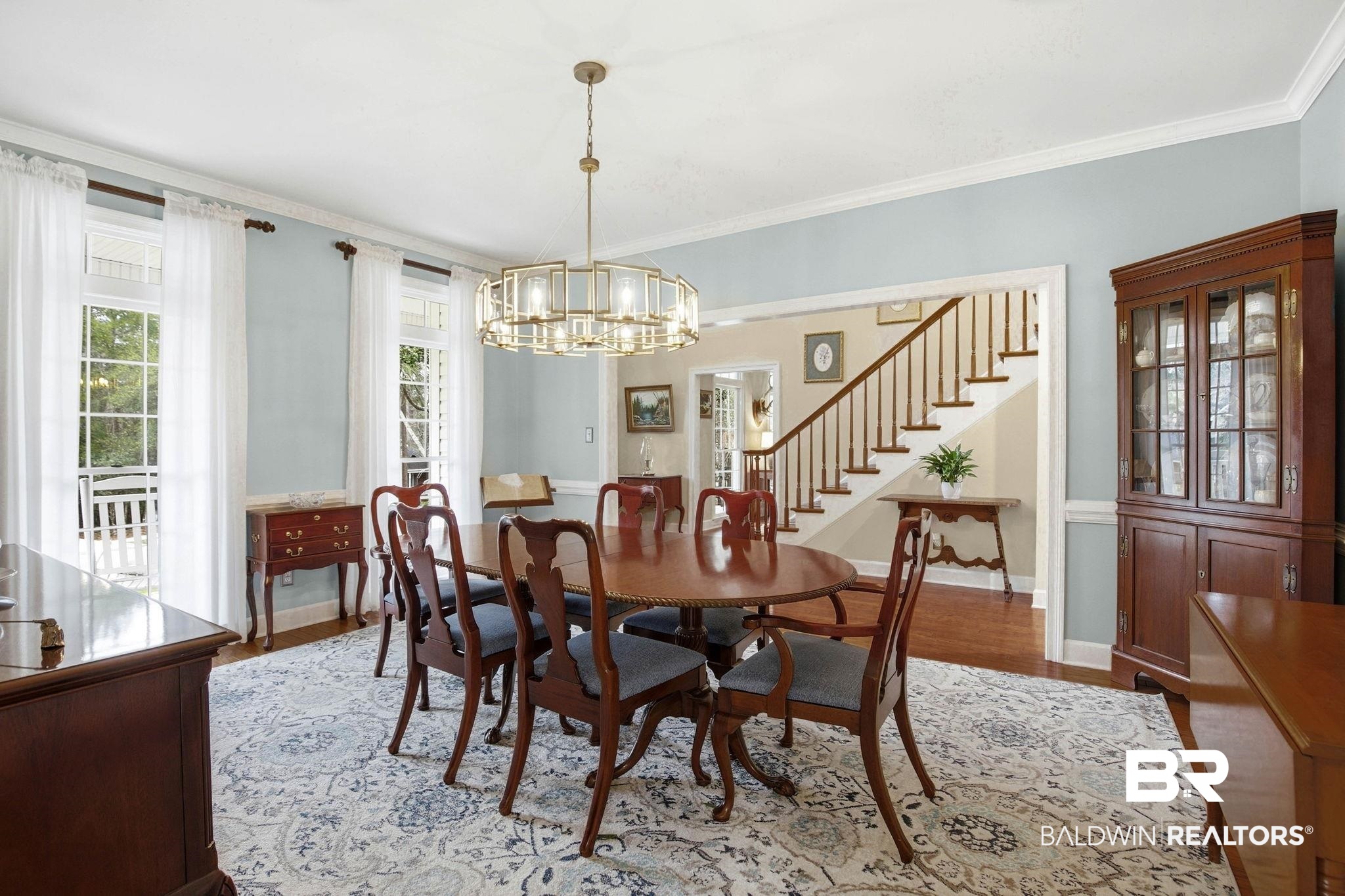 31515 Rhett Drive Spanish Fort, AL 36527 - Photo 13 of 100 The dining room measures 13' 1" x 16' 7" and has crown molding, lots of natural light and a beautiful chandelier.