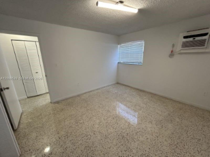 142 Southwest 18th Avenue, Unit 20 Miami, FL 33135 - Photo 5 of 8 an empty room with windows