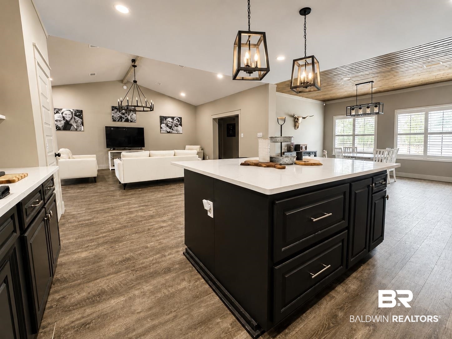 9825 Wolf Creek Ridge Elberta, AL 36530 - Photo 36 of 76 Central kitchen island with white countertop and dark cabinetry