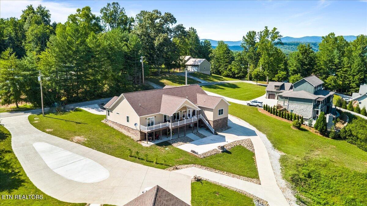 1380 East Norris Point Road La Follette, TN 37766 - Photo 49 of 54 Drone shot of back left of house