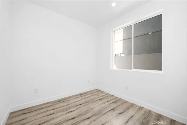 a bathroom with a shower and a sink