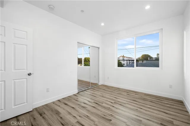 a bathroom with a shower and a sink
