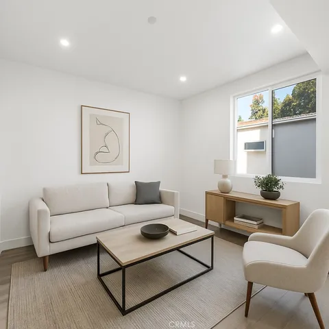 a bedroom with a bed and couch