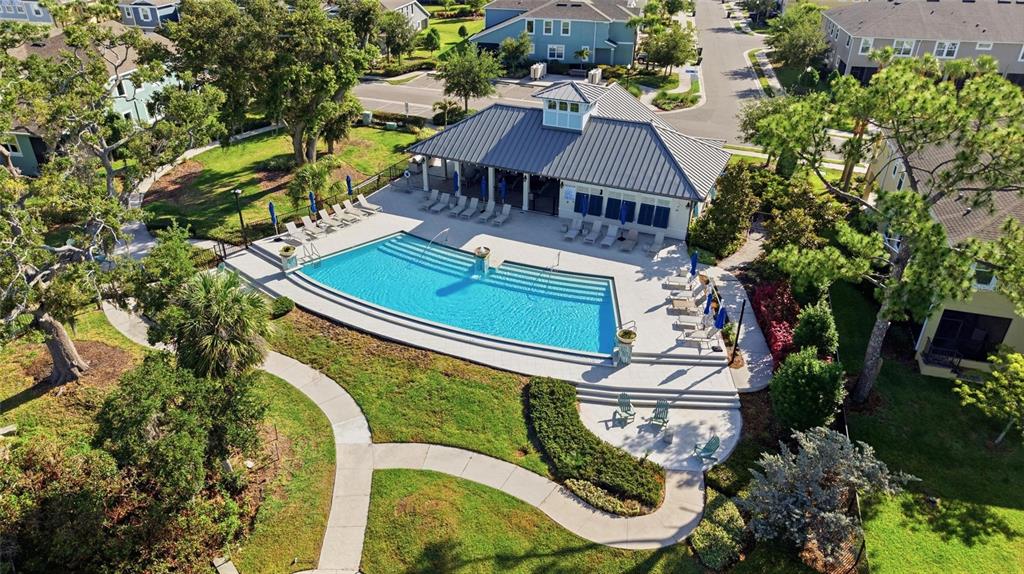 2013 Sunset Wind Loop Oldsmar, FL 34677 - Photo 41 of 43 an aerial view of a house with garden space and trees all around