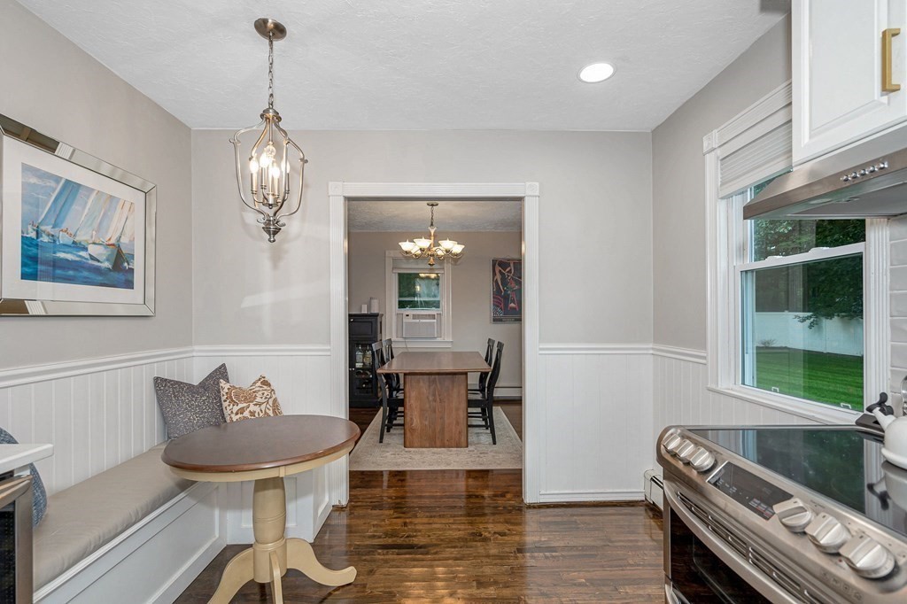21 Sherwood Road Wilmington, MA 01887 - Photo 13 of 42 a view of a dining room with furniture window and wooden floor