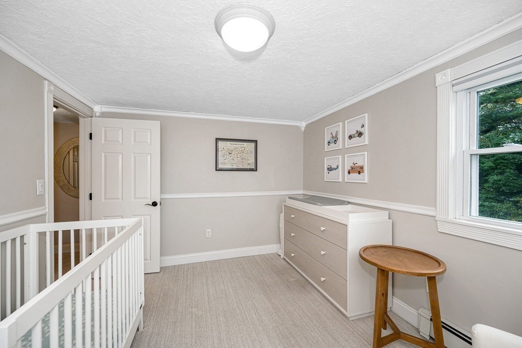 21 Sherwood Road Wilmington, MA 01887 - Photo 21 of 42 a bathroom with a sink a bathtub and a window