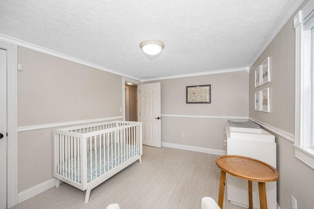 21 Sherwood Road Wilmington, MA 01887 - Photo 22 of 42 a view of a hallway with a hallway and stairs