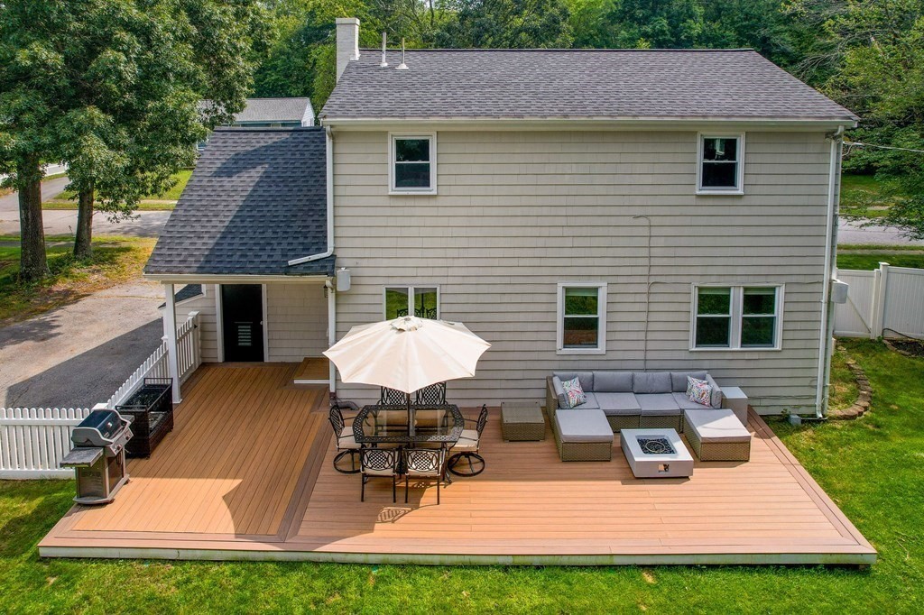 21 Sherwood Road Wilmington, MA 01887 - Photo 30 of 42 a view of a house with pool table and chairs