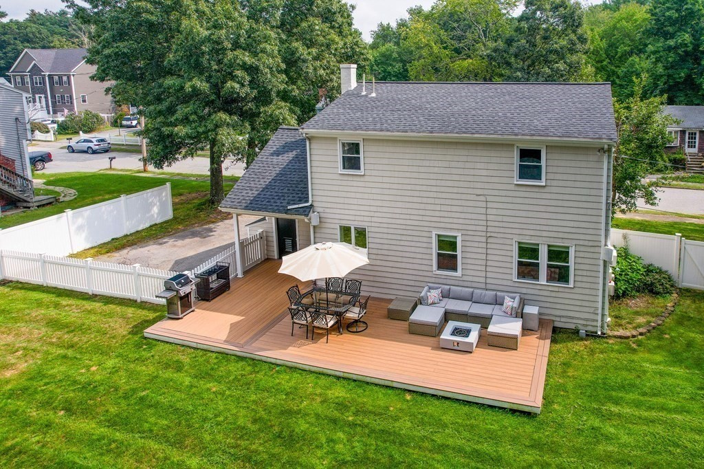 21 Sherwood Road Wilmington, MA 01887 - Photo 31 of 42 a view of a house with backyard and sitting area