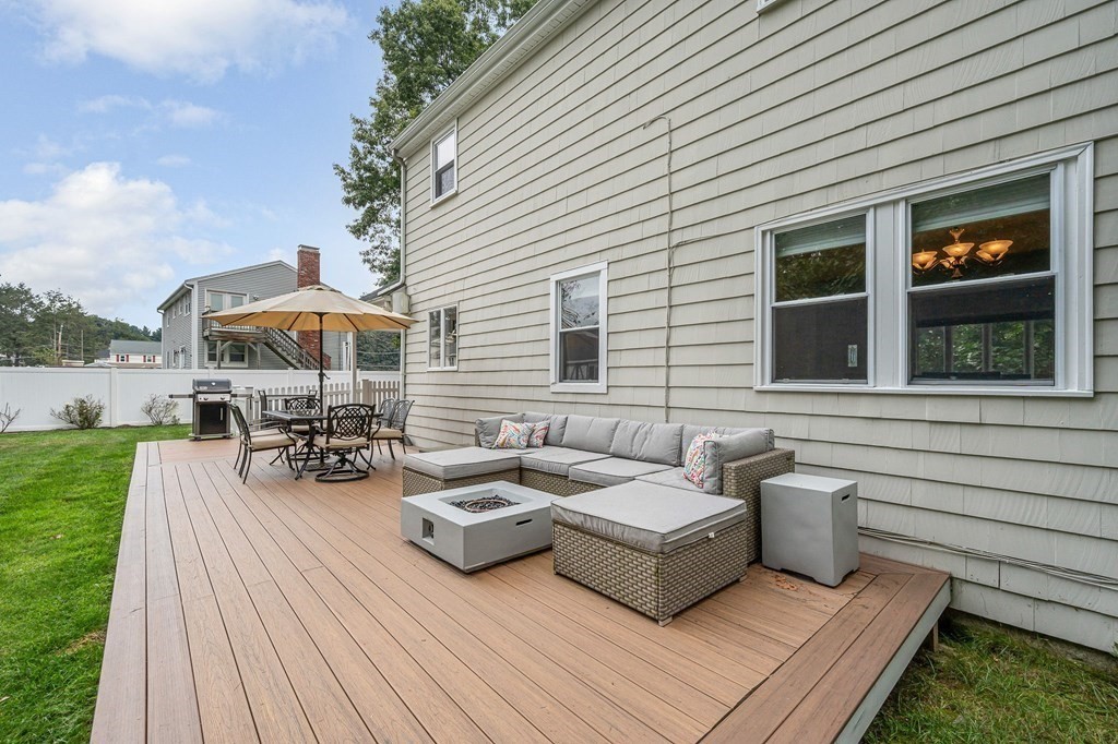 21 Sherwood Road Wilmington, MA 01887 - Photo 33 of 42 a view of a patio with couches chairs and potted plants