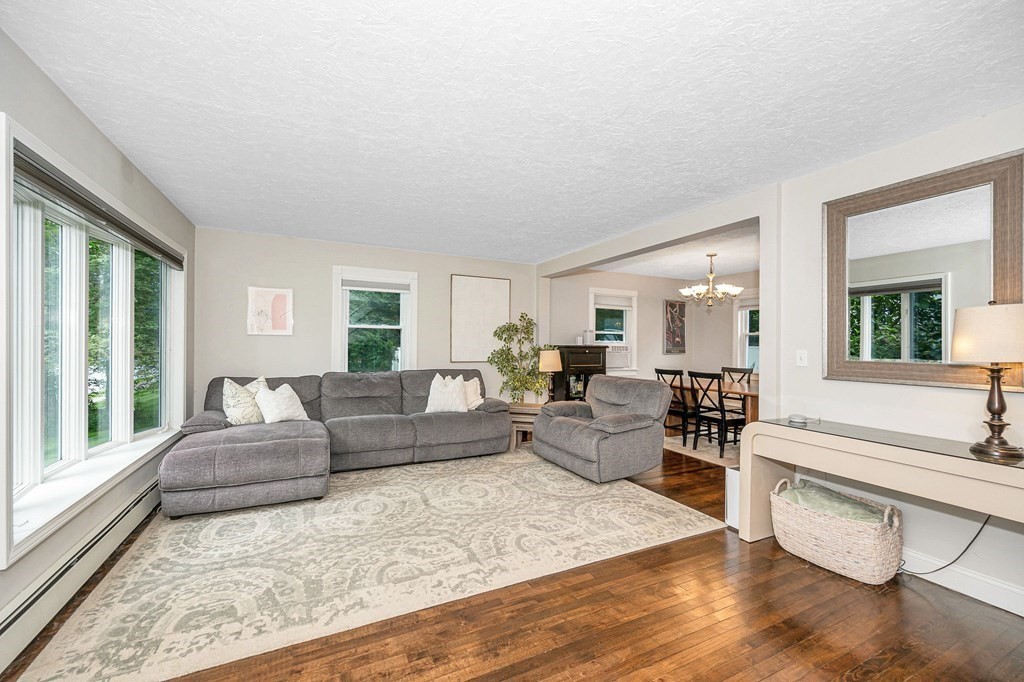 21 Sherwood Road Wilmington, MA 01887 - Photo 4 of 42 a living room with furniture and a large window