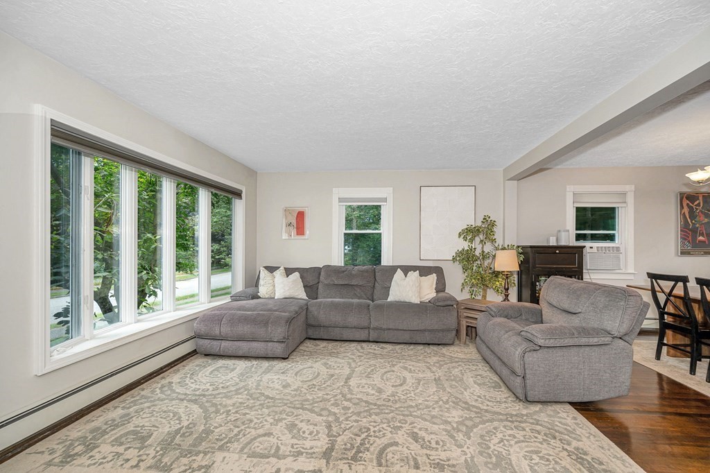 21 Sherwood Road Wilmington, MA 01887 - Photo 5 of 42 a living room with furniture and a large window