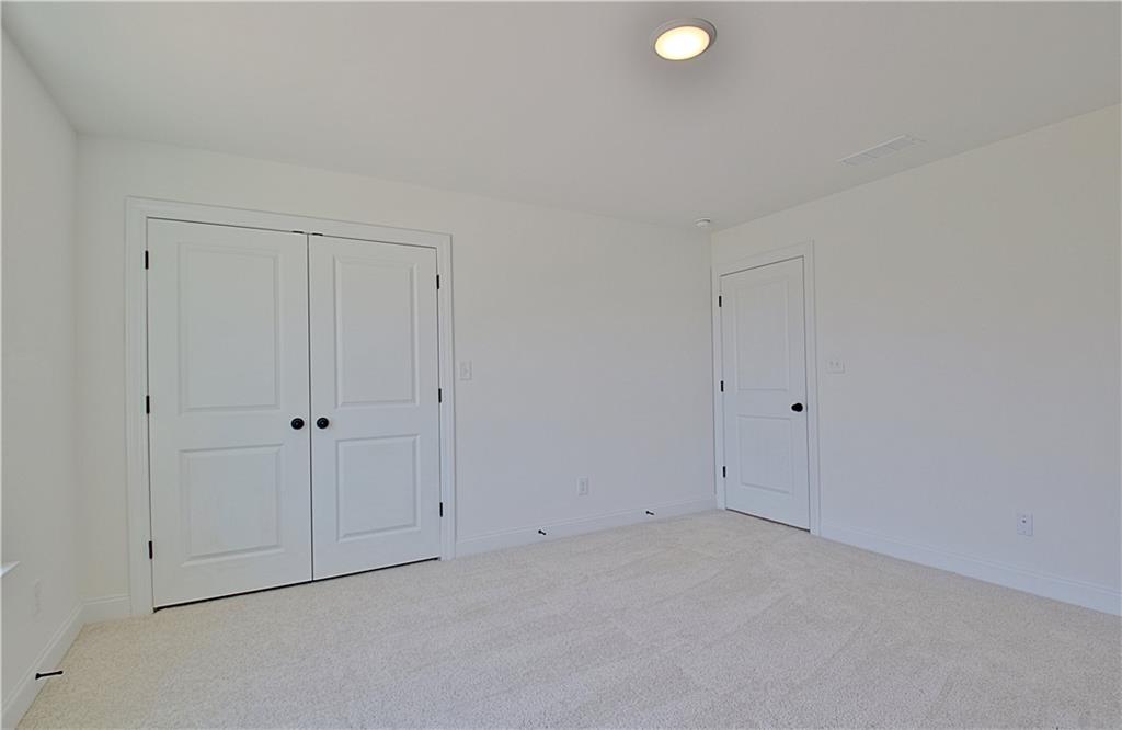 115 Rutland Court Senoia, GA 30276 - Photo 47 of 69 a view of an empty room