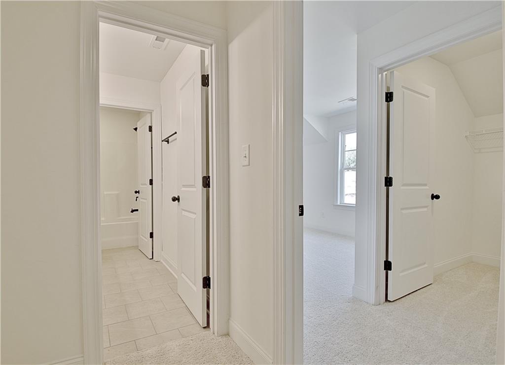 115 Rutland Court Senoia, GA 30276 - Photo 49 of 69 a view of a bathroom with a shower and a glass door