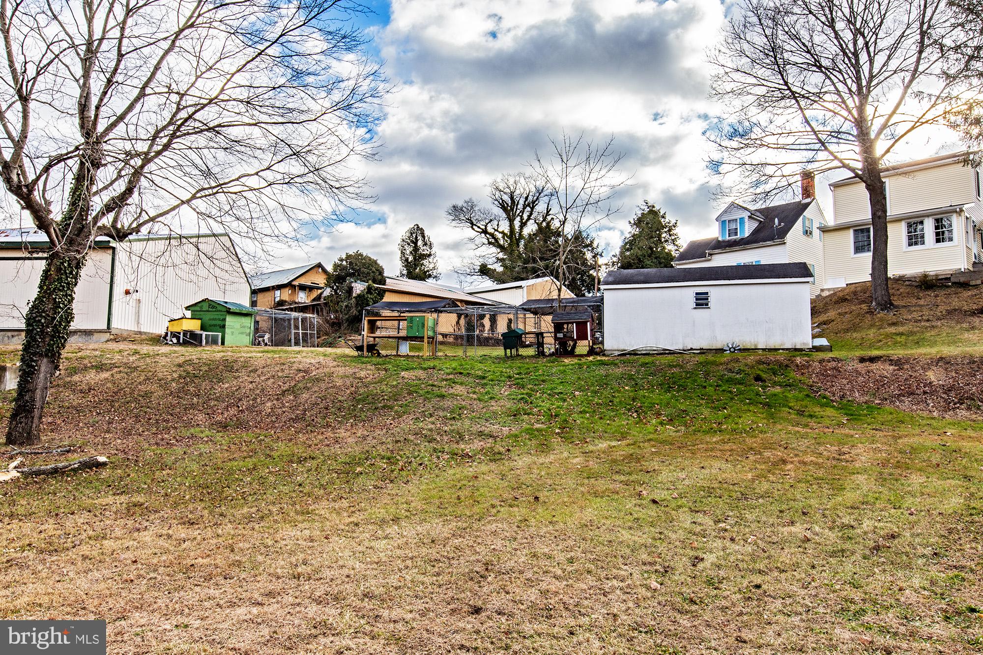 8 Water Street Alloway, NJ 08001 - Photo 3 of 16 a front view of a house with garden