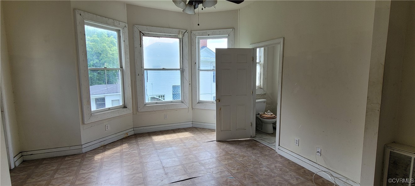 22 Corling Street Petersburg, VA 23803 - Photo 13 of 17 a view of an empty room with a window