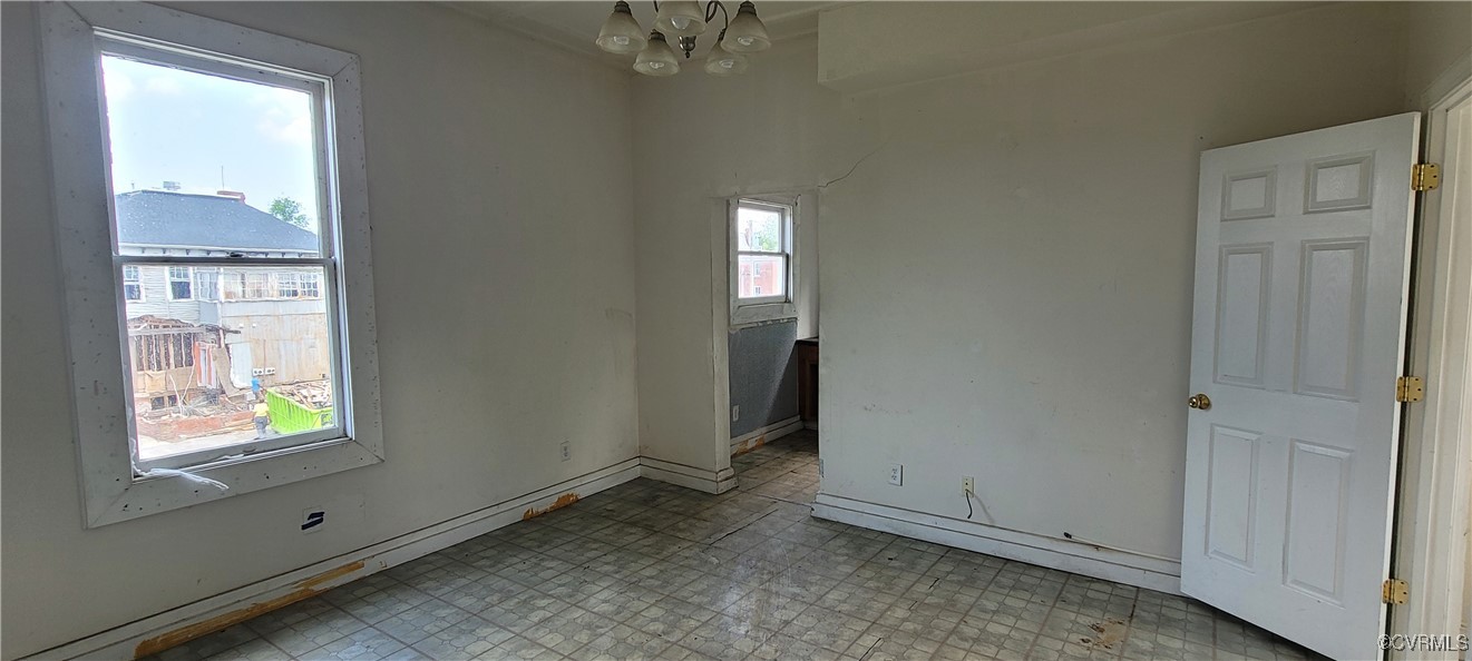22 Corling Street Petersburg, VA 23803 - Photo 14 of 17 an empty room with windows