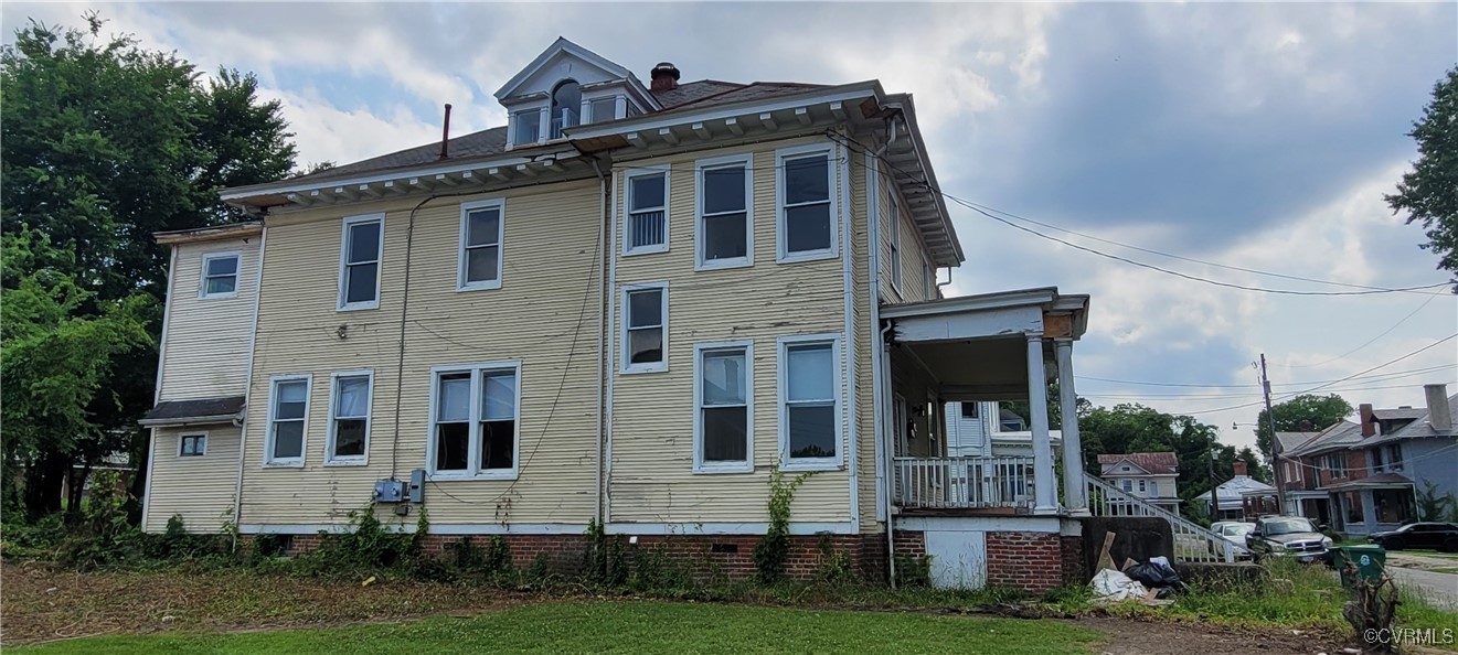 22 Corling Street Petersburg, VA 23803 - Photo 3 of 17 a front view of a house with a yard