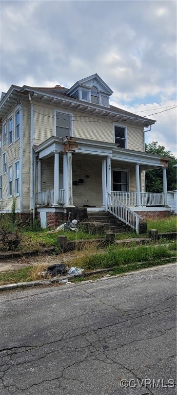 22 Corling Street Petersburg, VA 23803 - Photo 4 of 17 a front view of a house with a yard