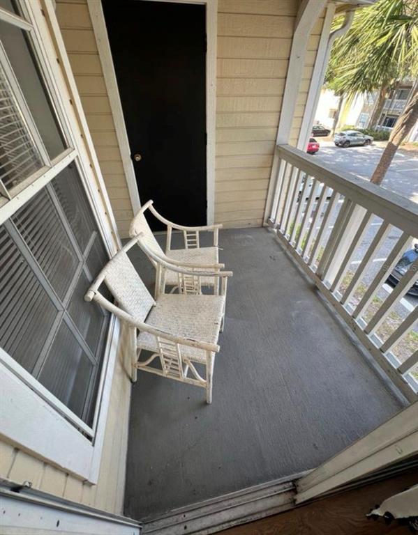 1081 South Hiawassee Road, Unit 721 Orlando, FL 32835 - Photo 14 of 18 a view of an outdoor space with seating area