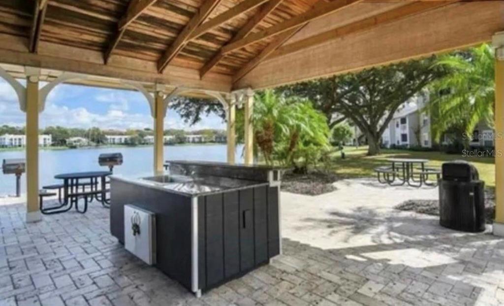 1081 South Hiawassee Road, Unit 721 Orlando, FL 32835 - Photo 17 of 18 a view of outdoor space with seating area