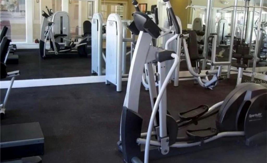 1081 South Hiawassee Road, Unit 721 Orlando, FL 32835 - Photo 18 of 18 a view of a room with gym equipment