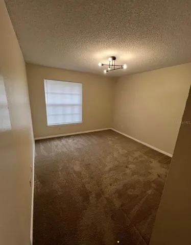 a bathroom with a sink a toilet and a shower