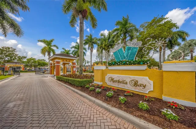 a view of a park with palm trees