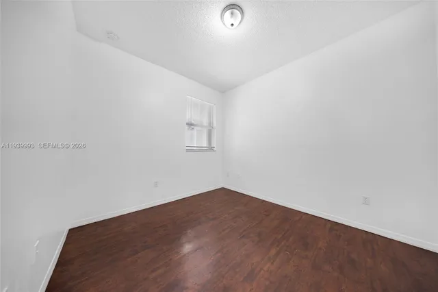 an empty room with a workbench