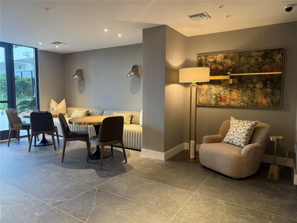 a outdoor living space with furniture and a view of living room