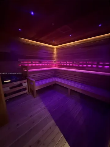 a empty room with a bookshelf