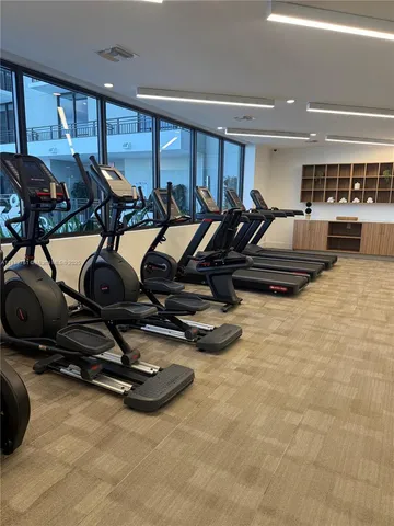 a view of a room with gym equipment