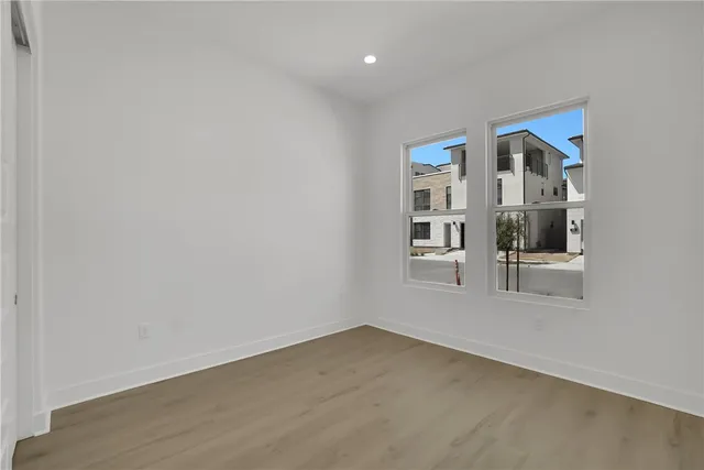 an empty room with windows