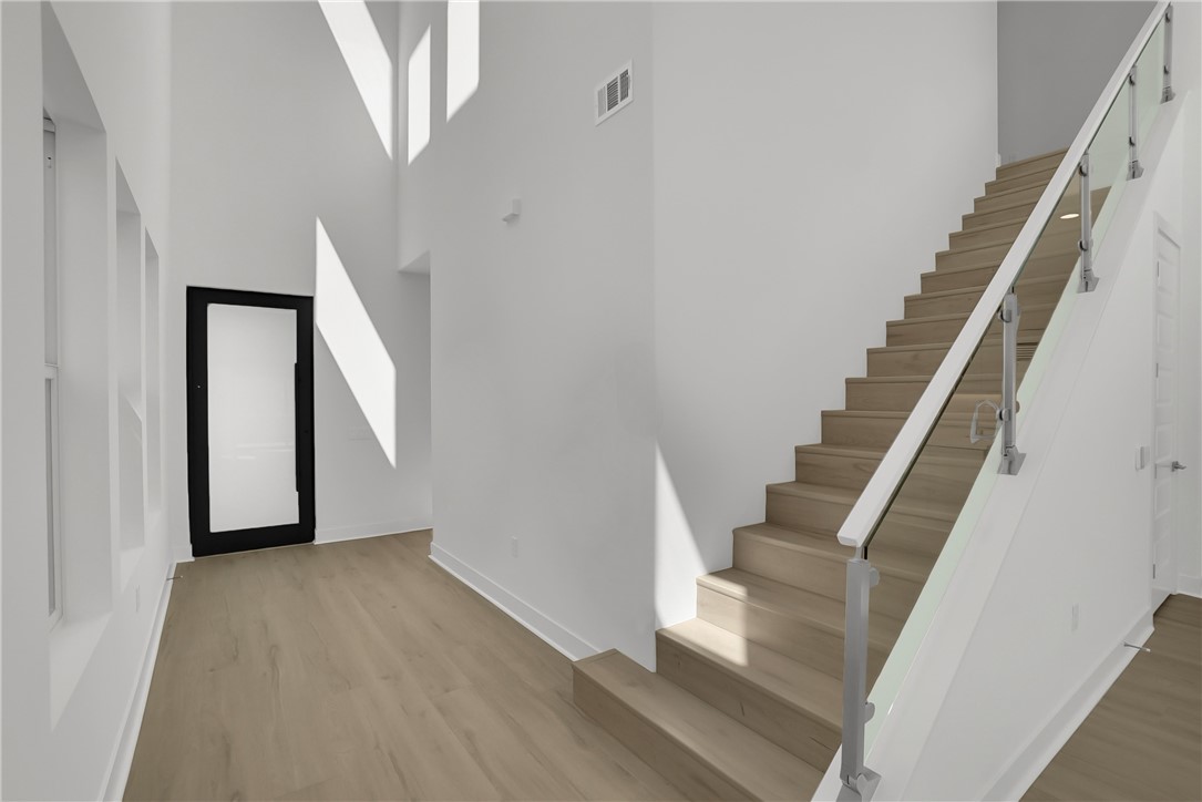 168 Creation Irvine, CA 92618 - Photo 22 of 59 a view of entryway with wooden floor