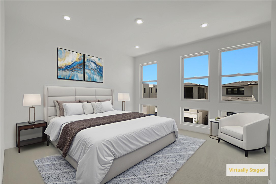 168 Creation Irvine, CA 92618 - Photo 41 of 59 a bedroom with a bed and a couch