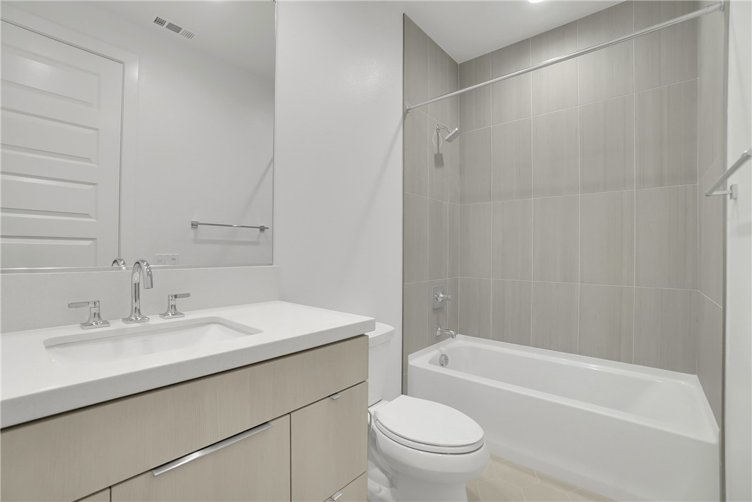 168 Creation Irvine, CA 92618 - Photo 43 of 59 a bathroom with a sink toilet and bathtub