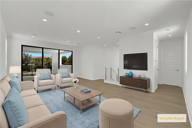 a view of a livingroom with white walls