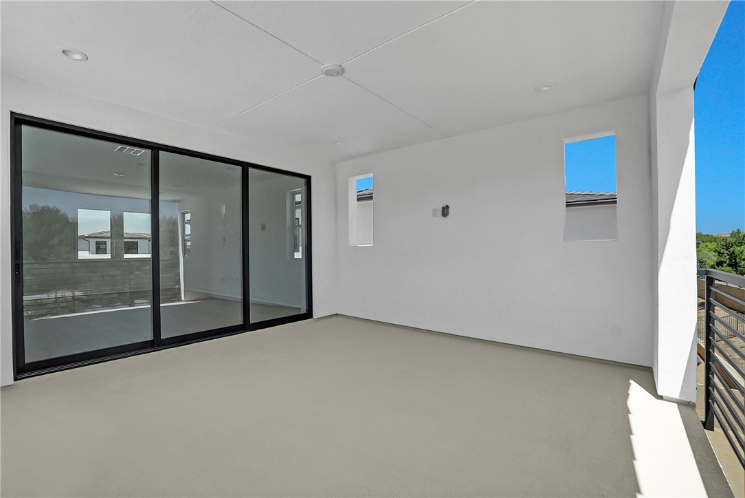 168 Creation Irvine, CA 92618 - Photo 48 of 59 a view of an empty room with glass door